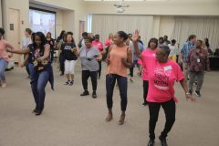Kissia Nathaniel led DHS staff in a lunchtime line dance session for  Fun Fit Friday at central offices.